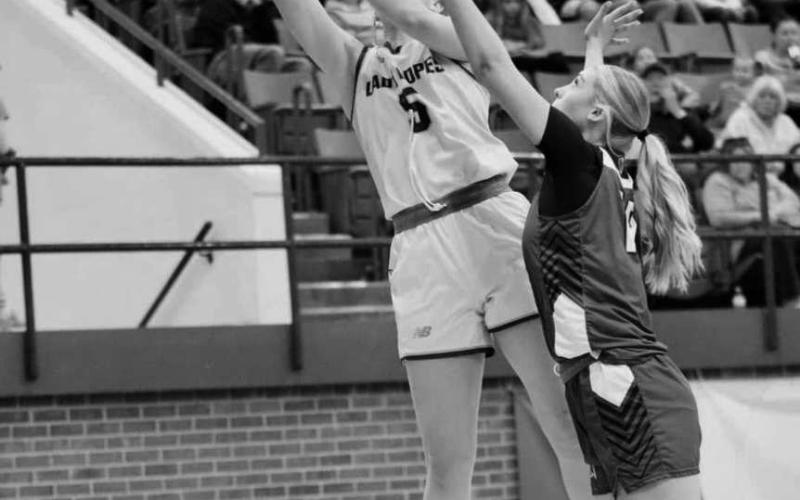 PHYSICAL - Whiteface Lady Lope Jaedyn Rector finished the layup through the contact of the Lady Cat at home during their distrcit mathup. (Staff photo by Aalijah Soliz)
