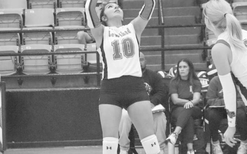 SETUP - Levelland Loboette Mia Morin set up her teammates this past Tuesday against the Seminole Maidens in their non-district matchup. (Staff photo by Aalijah Soliz)