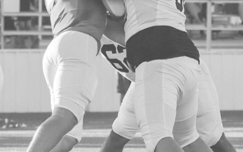 BRICK WALL - Levelland Lobo Casen Potter held his defender up not letting him through to get to his quarterback this past Friday against the Idalou Wildcats on the road. (Staff photo by Aalijah Soliz)