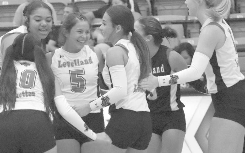 CELEBRATION - The Loboettes celebrated an earned point this past Tuesday against the Maidens in their non-district matchup. (Staff photo by Aalijah Soliz)