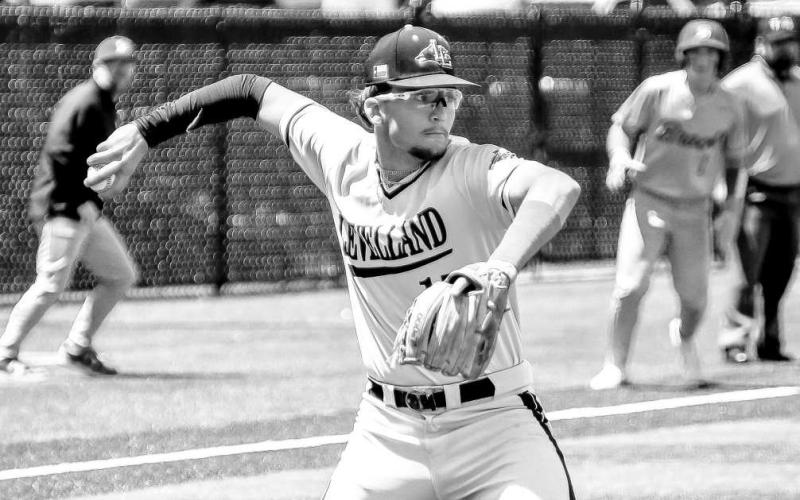 LOCKED IN - Senior Rance Massey took the mound in game one against the Brock Eagles during their bidistrict round. Pictured is Massey fielding a slow-roller to the mound for the easy out. (Staff photo by Dom Puente)