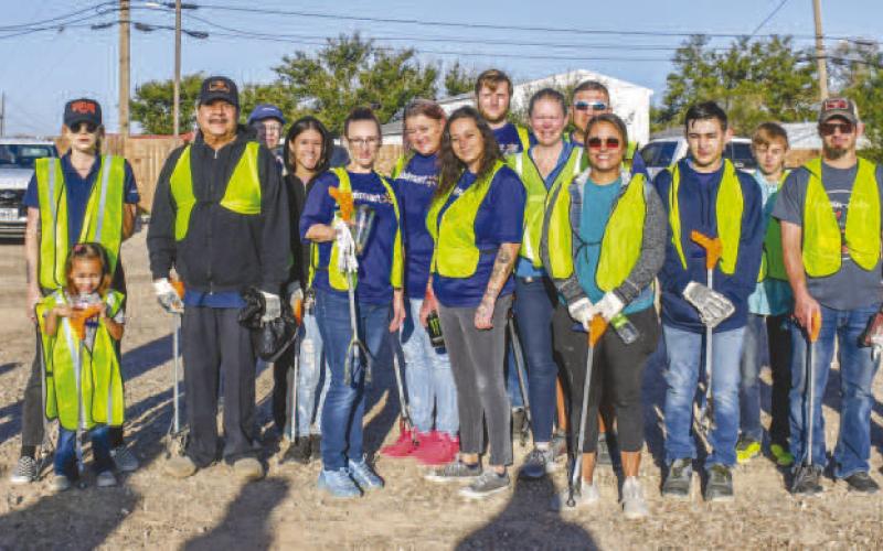 GROUPYOU CAN ALWAYS COUNT ON - Members of the Levelland Walmart Supercenter participated in the Keep Levelland Beautiful Community Wide Clean-Up event held this past Saturday. Walmart has been a continuous supporter of the clean up events held every year. The next clean up will be held in the spring for interested volunteers. This year the number of volunteers unofficially reached 100. (Staff photo by Essence Childres)