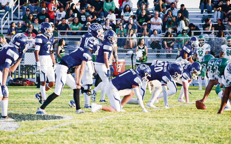 BOBCAT DEFENSE ON THE PROWL - The Smyer Bobcats defense prepares for the play and reads the opposing offense during their football game earlier this season at home against Floydada. The defense ended the season with 58 tackles for loss, 6.5 sacks, six fumble recoveries and three interceptions. (Photo provided by Smyer ISD)