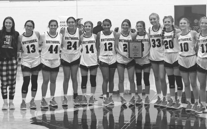 TOURNAMENT WINNERS - The host Whitharral Lady Panthers were champions with a 3-0 record in the Whitharral Invitational High School Basketball Tournament last weekend. The Lady Panthers are currently ranked 20th in UIL Class 1A by the Texas Association of Basketball Coaches. (Staff photo by Jay Kelley)