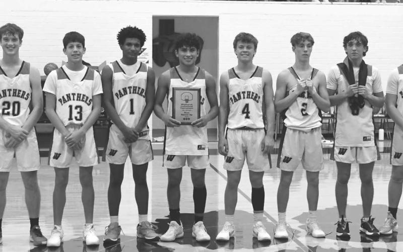 RUNNER-UP - The host Whitharral Panthers took second place in the Whitharral Invitational High School Basketball Tournament, falling to the All Saints Episcopal Warrors 49-37 in the championship game Saturday night. (Staff photo by Jay Kelley)