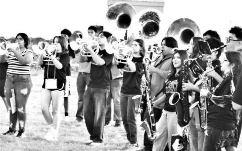 MAKE SOME NOISE- The Levelland ISD band participated in the My Hometown revival this past Wednesday. Community members came out to support the Lobos. The event had food trucks, a pep rally and ended with a bon fire. (Staff photo)