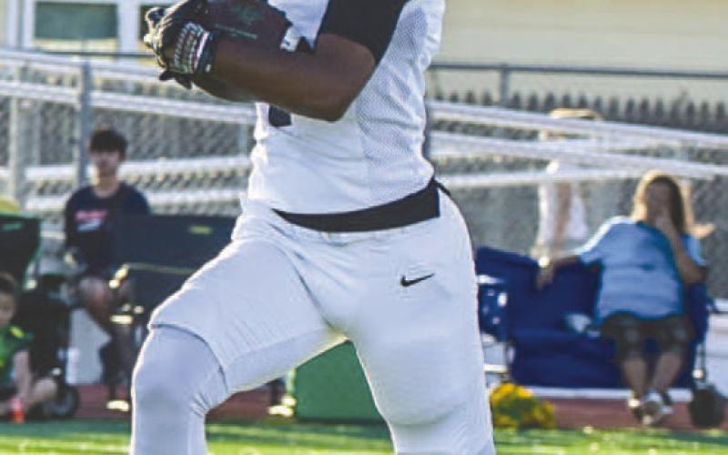 KICKOFF RETURN - Levelland Lobo Sean Landrum ran the ball upfield at the start of the game during the team’s game against the Idalou Wildcats last Friday night. (Staff photo by Aalijah Soliz)
