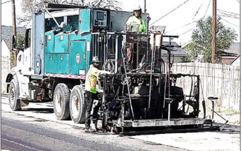 The City of Levelland street micro surfacing project is underway on Sherman, Alamo, Austin, Ave. A, Ave. C streets with some road closures and limited traffic. Residents were urged to avoid parking on streets where sections were being worked on. (Staff Photo)
