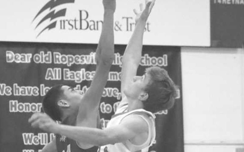 JUMP BALL - Whiteface athlete Jeremias Chavez and Ropes athlete Landon Nale jumped at the start of the game to give their team possesion of the ball during one of the first games of the season. (Staff photo by Aalijah Soliz)