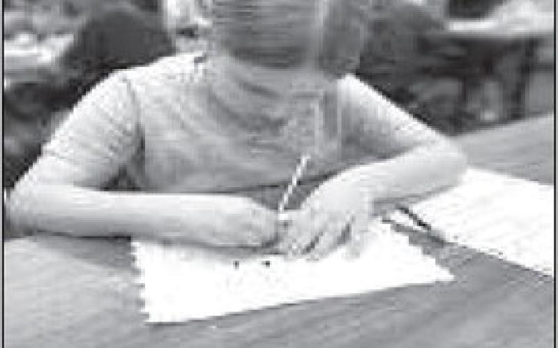 CREATIVE LEARNING- Capitol 4th grade students are learning the importance of renewable and nonrenewable resources in Mrs. Clara Sander’s class. They learned the effect of coal mining and what it does to our land. In Photo is Piper Williams she is engaged in a stem activity called chocolate chip mining. (Photo submitted by Cristal Isaacks)