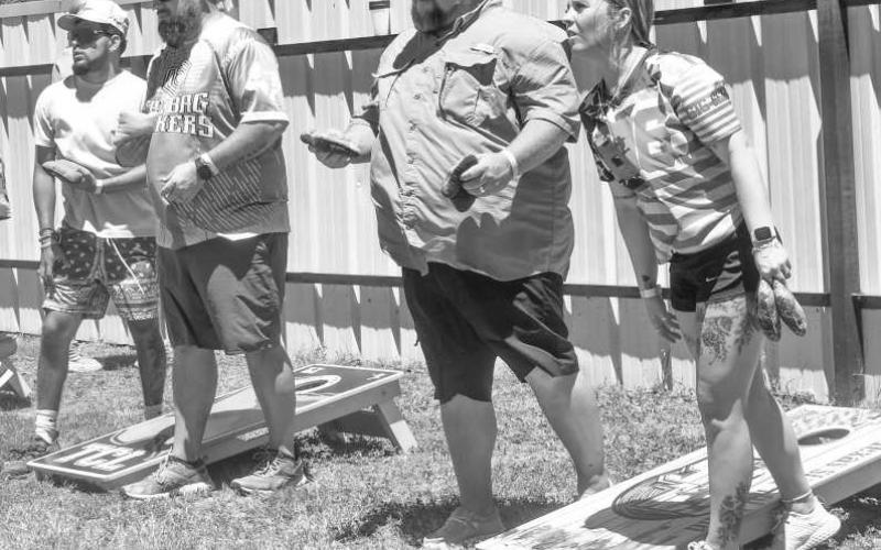 SOLID COMPETITION - The Smyer VFD held their first cornhole tournament (Fire In The Hole Cornhole Tournament) on Saturday in Smyer. All proceeds benefit the Smyer Fire Department as they are trying to raise money for a new station. (Staff photo by Emily Campos)