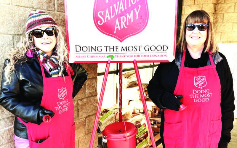 RING THE BELL- Levelland ISD Special Education Director Lacey Doster and DAEP Administration Laurie Jones are ringing the bell for the Salvation Army. Throughout the month of December, LISD administrators and educators will be ringing the bell to help raise funds for the Salvation Army to make a meaningful difference for individuals and families across Texas. (LISD photo)