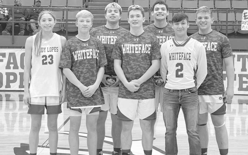 WHITEFACE SENIORS- Whiteface High School boys and girls varsity basketball teams recently celebrated senior night. Pictured from left to right are: Allison Martha, Gavin Baker, Beau Brewer, Joel Fortner, Jeremiah Soliz, Noah Rector and Brighton Scoggins. (Photo Courtesy of Holly Crutcher)