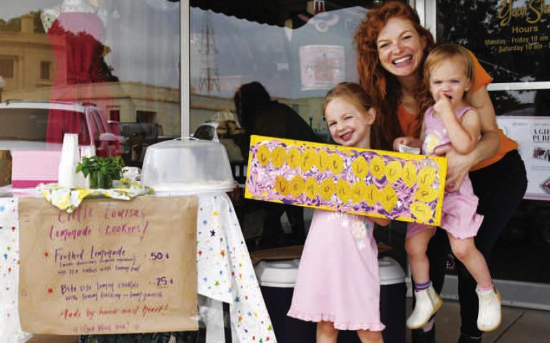 REFRESHING DRINK - Little Louisa’s Lemonade booth offered a Columbian lemonade with fresh mint at Lemonade Day on the downtown Levelland square Saturday during First Saturday Shop the Square. Best lemonade won a $200 downtown dollar prize and best decorated won a $100 downtown dollar prize. (Staff photo by Victoria Byrnes)