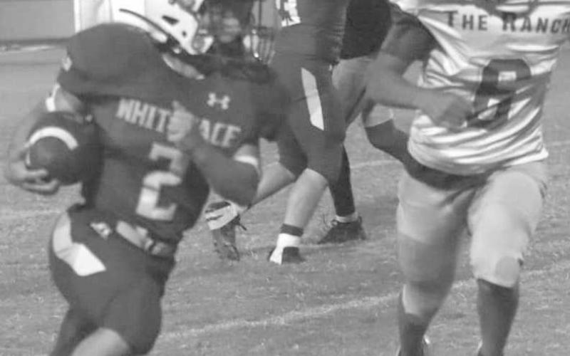 TOO QUICK - Cash Crutcher had a seven-yard touchdown run for the no, 4 Whiteface Antelopes last Friday in a 60-0 home win over Boys’ Ranch in UIL high school six-man football action. Whiteface will host no. 13 Klondike on Friday at 7:30 p.m. (Photo by Holly Crutcher)