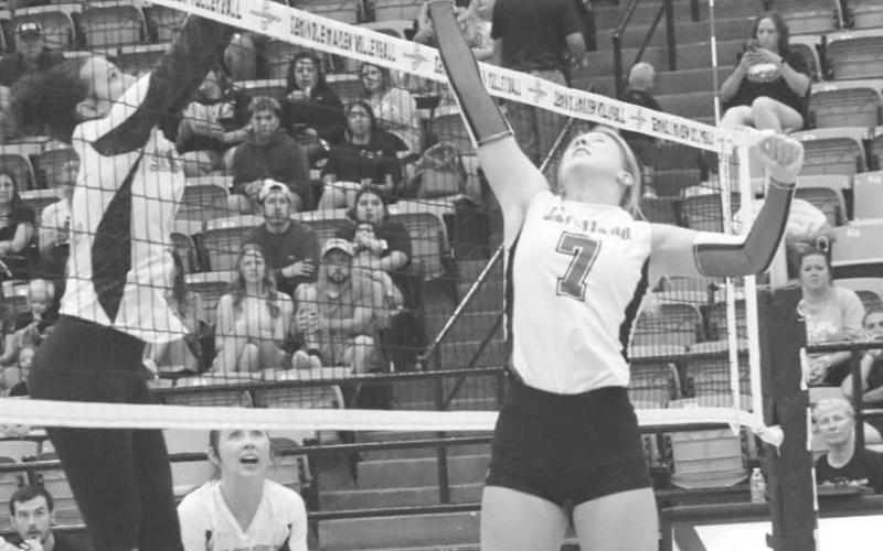 MEET IN THE MIDDLE - Levelland Loboette Addisen Campbell met the Seminole defense at the net to get her team a point last Tuesday night on the road. (Staff photo by Aalijah Soliz)
