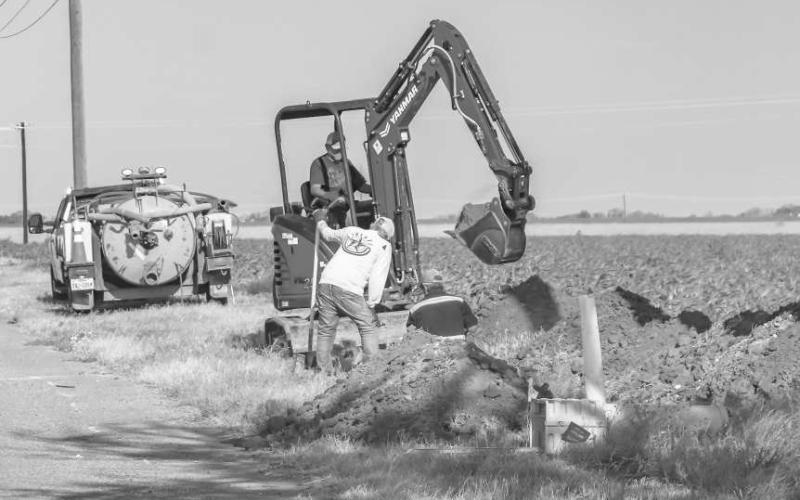 TRENCHING FOR FIBER - As a new school year approaches, a small crew was digging a trench to address some fiber optic wire that was being connected for Levelland ISD next to ABC Elementary. (Photo courtesy of Emily Campos)