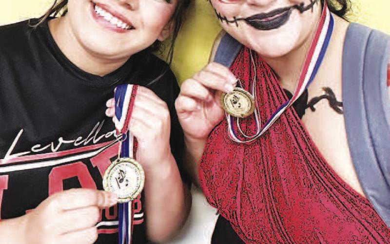 LHS ENSEMBLE SOLOS-- LHS Allegro Winterguard Mia Chavarria and Rosa Servin each received Division 1 ratings for their solos at the Howard County Indoor Festival. (Levelland ISD photo)