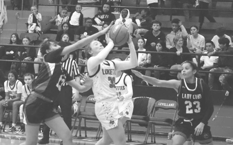 HARD SHOT - Levelland Loboette Presly Smith made the tough layup during the teams win against Brownfield last Tuesday night. The Loboettes traveled to Hereford to take on the Whitefaces this past Friday night. (Staff photo by Aalijah Soliz)
