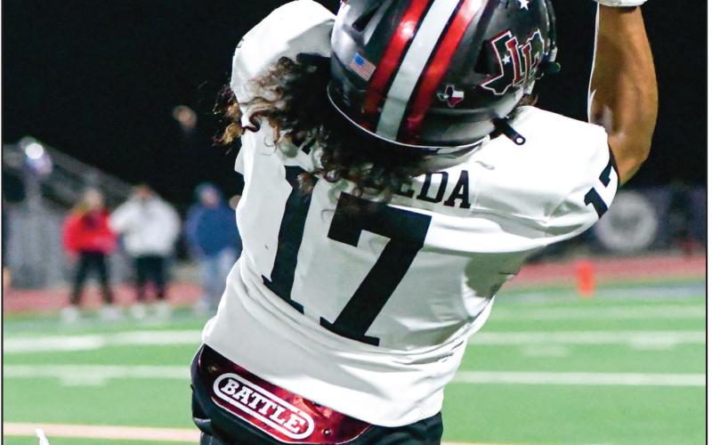 SHEER FOCUS - Levelland freshman wide receiver Bentley Sepulbeda focuses intently on the football as he makes an over-the-shoulder catch during the Lobos game against Liberty this past Friday night at Patriot Stadium. Sepulbeda would end with 56 receiving yards and a touchdown. (Staff photo by Jentezen Smith)