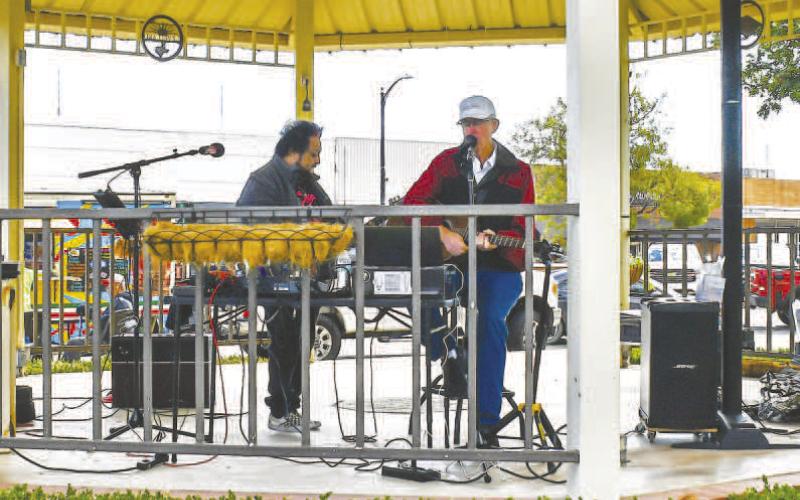 LIVE MUSIC DURING LUNCH - For the last Food Truck Thursday live music was provided courtesy of Juan Partida and Nick Williams. The duo played some of their favorite songs Thursday under the gazebo in downtown Levelland. (Staff photo by Essence Childers)