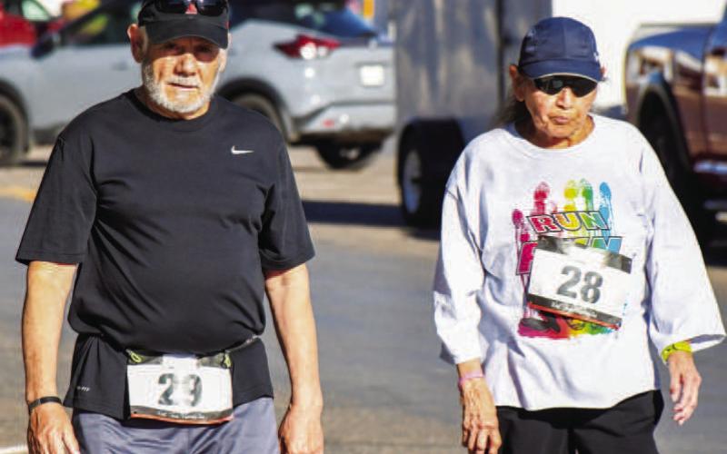 FUN IN THE SUN - Over 100 people participated in the Run the Mosaics Bobby Birdson Memorial run last Saturday in downtown Levelland. All three races showcased the mosaics located around Levelland with identifying flags for each one. The Levelland Police Department and South Plains College Police personnel provided safe running spaces for all runners as traffic was oncoming throughout the races. (Staff Photo by Dom Puente)