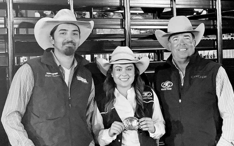 BARRELRACECROWN- Lady Texan barrel racer Madison Bean snagged the women’s all-around crown Saturday as the South Plains College men’s and women’s rodeo teams each placed second in the final team standings at the Texas Tech University Rodeo. Pictured from left ot right are: Stefan Ramone, Madison Bean, Kerry Doster. (Photo Courtesy of Jordan Irvine)