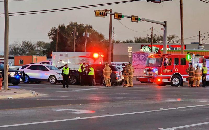 MULTIPLE VEHICLE WRECK - Around 6 p.m. Sunday, a vehicle traveling eastbound on Highway 114 was clipped by a vehicle attempted to turn onto the highway at the intersection of College Avenue and Highway 114. The vehicle traveling eastbound collided head on with a car in the turning lane waiting to get onto College Avenue. A vehicle sitting behind the car in the turning lane was also damaged as front end was pushed in. (Staff Photo by Dom Puente)