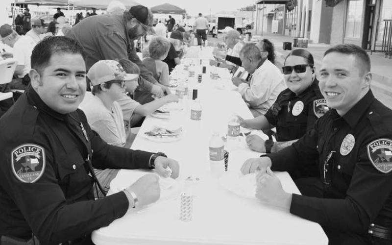 PRE-PATROL PANCAKES-- The Levelland Rotary Clubs hosted its annual Rotary Morning Breakfast to kick-off the Cotton &amp;amp; Crude Festivities Saturday. Pictured are Levelland police officers Victor Feregrino (left), Blake Parker and Rocio Gameros enjoy breakfast together before starting work for the day. (Submitted Photo by Delany Jackson)