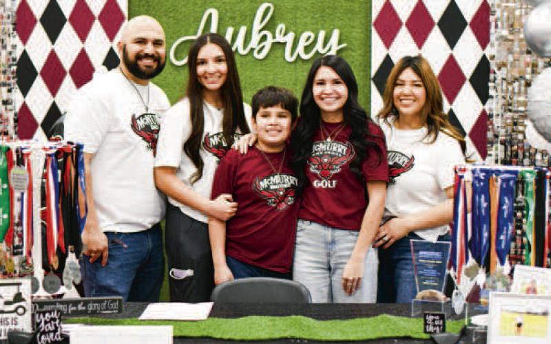 MORIN SIGNS WITH MCMURRY - Levelland's Aubrey Morin signed to play collegiate golf at McMurry University located in Abilene, Texas, this past Friday at Levelland High School. Morin is second from the right, surrounded by her family. (Staff photo by Jentezen Smith)