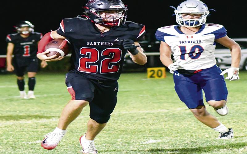 RUNNING MACHINE - Whitharral senior Greg Johnson takes the carry during their Homecoming game against Valley at McCormack-Doshier Field this past Friday night. Johnson would end up with 253 rushing yards and four touchdowns on the night in the Panthers 68-48 win.