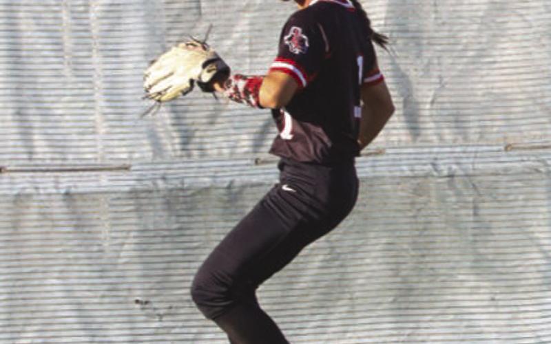 OUT - Levelland Loboette Saydi Mendez threw the ball back to her team after catching a pop fly into center field during the team’s game against the Plainview Lady Bulldogs. (Staff photo by Aalijah Soliz)