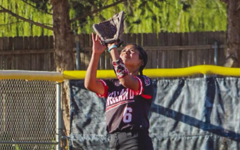 EYE ON THE BALL- Levelland Loboette Danica Rivera caught the pop fly headed to her during the team’s contest against Plainview this past Tuesday at home. (Staff photo by Aalijah Soliz)