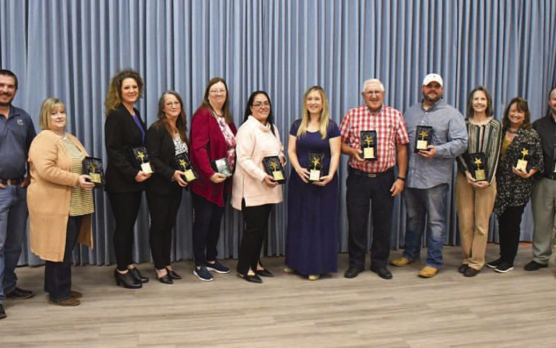 VOLUNTEER RECOGNITION - The Levelland Chamber of Commerce recognized and celebrated their volunteers during the Annual Volunteer Luncheon Friday. The luncheon was held at South Plains College in Levelland in the Sundown Room. Pictured from left to right are: Garth McDonald, Missy Black, Brooke Barrett, Heidi Blair, Christy Clevenger, Janie Mireles, Kati Moody, Jim Mara, Dusty Slaughter, Becky Currington, Tammy Franklin and Ty Gregory. (Staff Photo by Dominick Puente)