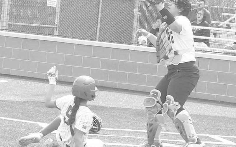 ONE OF 20- Erica Posada scored one of 20 Sundown runs against the visiting Petersburg Lady Buffaloes Saturday in UIL high school softball action. The Roughettes won 20-1. (Photo Courtesy of Jay Kelley)