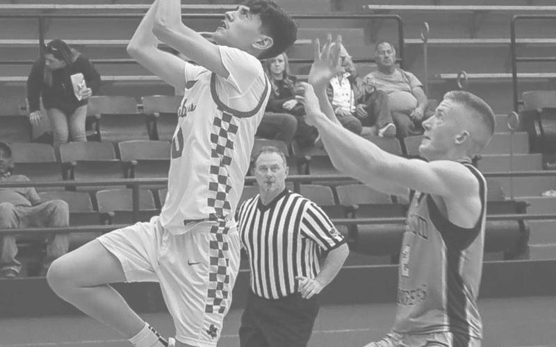 LAY-UP - Levelland Lobo Anthony Gonzales layed the ball up during a fastbreak to get the team an easy two points last Tuesday at home against Greenwood. (Staff photo by Aalijah Soliz)