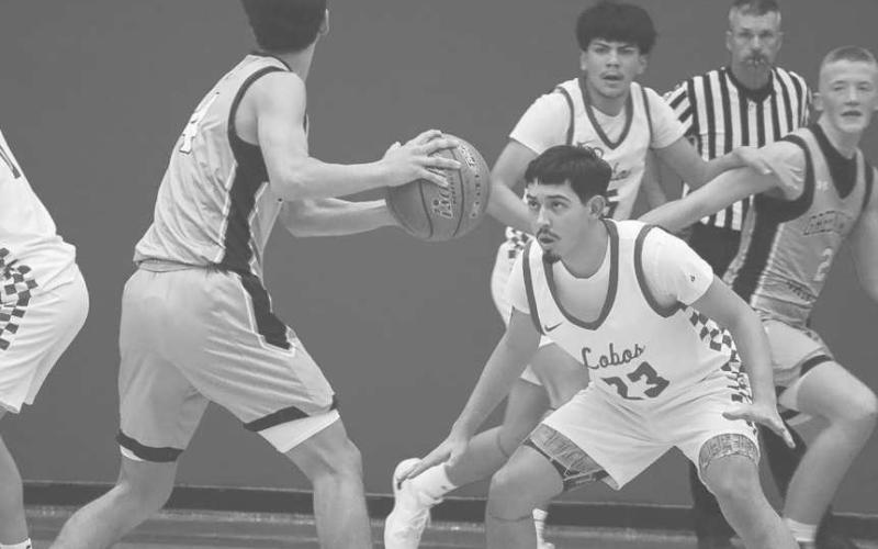 DEFENSE - Levelland Lobo Ozzie Solano made the Greenwood ballhandler pick up his dribble this past Tuesday during the team’s home game against the Rangers. (Staff photo by Aalijah Soliz)