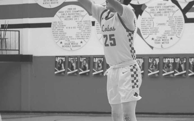 THREE - Levelland Lobo Eli Randol shot the ball from deep during the team’s win against Greenwood last Tuesday at home. (Staff photo by Aalijah Soliz)