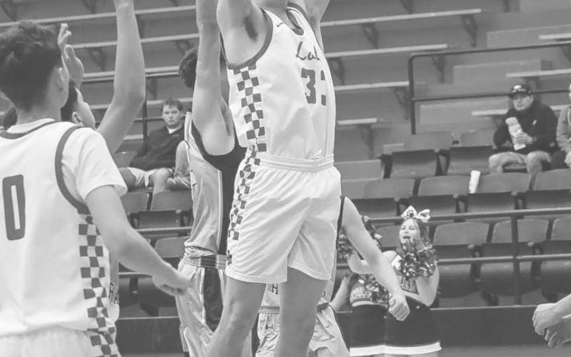 POST UP - Levelland Lobo Gage French grabbed the rebound for the putback last Tuesday at home against the Rangers in the team’s win. (Staff photo by Aalijah Soliz)