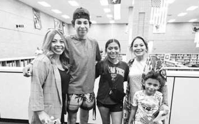 LHS OPEN HOUSE- LHS hosted their open house this past Thursday. Dr. Birdwell gave his State of the High School Address informing parents and students of the programs and opportunities this upcoming year. Parents and students met with teachers and toured the campus. Pictured are Juanita &amp;amp; Nathaniel Reyes, Elizabeth, Karen &amp;amp; JesseJames Torres.