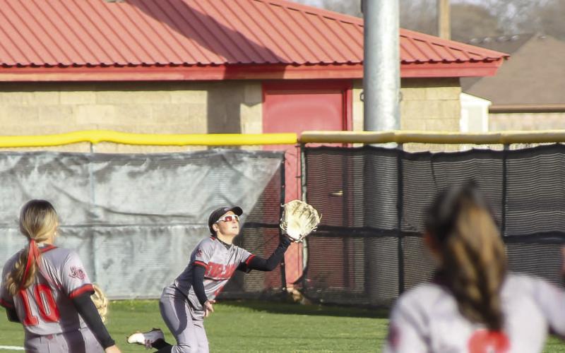 DIVING GRAB - Loboette Tiffany File made a diving catch in right field in the top of the fifth inning during their matchup against the Big Spring Lady Steers. The big play by File aided pitcher Danica Rivera as she was trying to close out the game with runners in scoring position. The grab would earn the Loboettes a second out in the shutout. (Staff photo by Dom Puente)