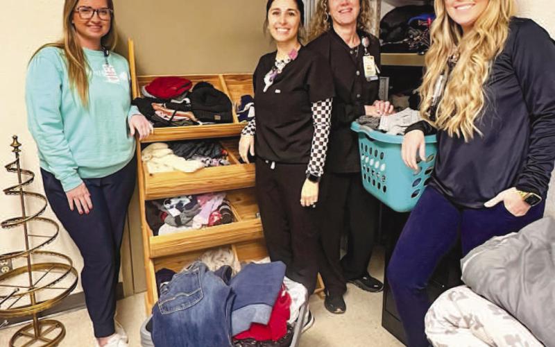 CAREGIVERS FOR THE COMMUNITY - Covenant Levelland has put together a committee that focuses on various ways to support the community. Through those efforts, a Winter Gear Drive will be held Friday, December 6, at the old Central Billing Office (CBO) on the Covenant Levelland Campus from 9 a.m. to 4 p.m. The items are free to the public. Donations from the public or caregivers can be taken to any three donations bins located at the hospital. Pictured from left to right are: Stephanie Bihl, Amanda Tienda, Bro