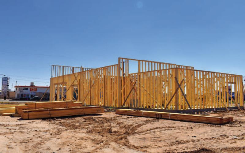 - Construction crews are continuing to work on the lot located at the corner of Highway 114 and Highway 385. Foundational work has been completed for workers to begin framing the new building. (Staff photo by Emily Campos)