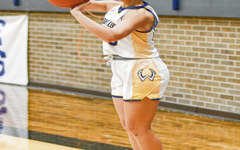SPOT UP SHOOTER - Whiteface Lady Lope Lainey Sanders spots up and shoots a threepointer during their game against Ropes this past Tuesday at Whiteface High School. Sanders would score 14 points in the win. (Staff photo by Jentezen Smith)