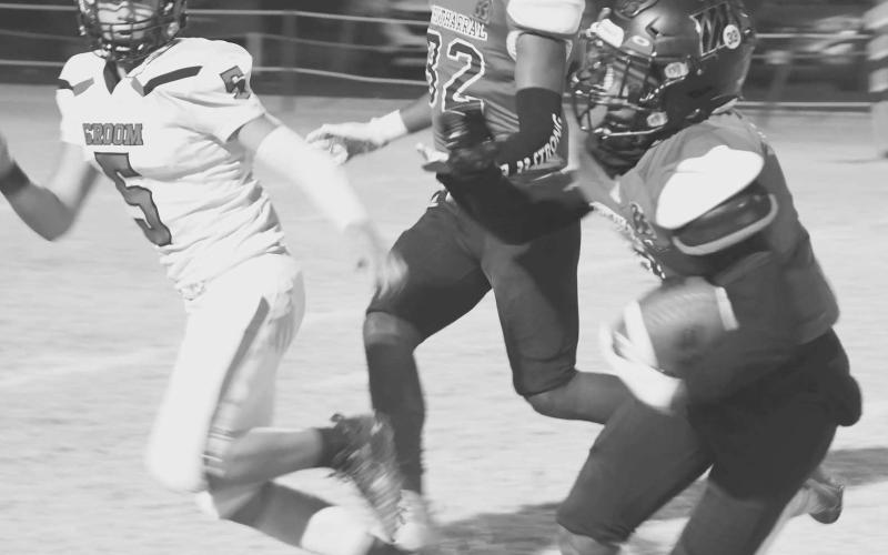 BREAK AWAY SPEED - Whitharral’s Brent Robinson had seven carries for 105 yards and a touchdown in a 60-12 UIL Bi-District High School Class 1A-2 win over the Groom Tigers last Thursday in Silverton. Whitharral will face the Klondike Cougars on Friday at 7 p.m. in Hermleigh. (Staff photo by Jay Kelley)