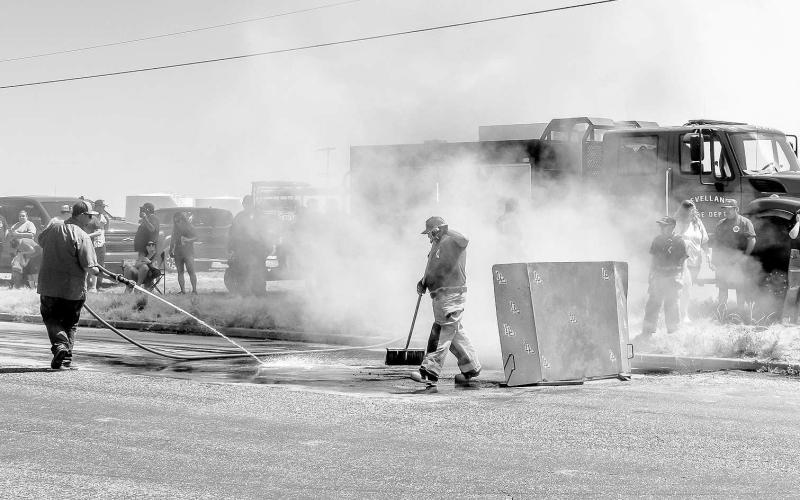 BURNOUT SAFETY - Similar to years past, the Levelland Fire Department oversaw the clean up of leftover rubber left by burnout competitors and ensured the area was properly soaked during the burnout portion of the Thunder on the Plains Car Show. (Photo courtesy of Emily Campos)