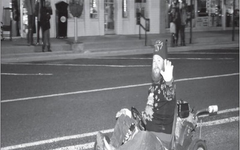 GO CART FUN- This past Thursday, Levelland Main Street, SPC &amp;amp; the Marigolds hosted Festival of Lights Christmas on the Square. The event started with the lighting of the SPC campus and the festivites moved to the Square. There were over 20 entries that participated in the parade. In photo was one of the parade participants. It was a night full of fun with many activities for the everyone that attended .(Staff photo by Emily Campos)