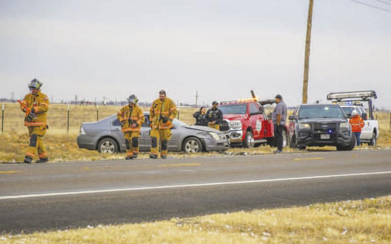 HIGHWAY COLLISION - The Hockley County Sheriff’s Office (HCSO), Levelland Fire Department (LFD), Levelland Emergency Medical Services (LEMS) and Texas Department of Transportation responded to a two-vehicle collision along West Highway 114 and FM 303. A fire report provided by the LFD stated all occupants of the vehicles were out before arrival to the scene. (Staff photo by Dom Puente)