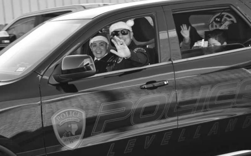 BLUE SANTAS - The Levelland Police Department and Blue and You hosted an their annual Blue Santa Event which began with escorting local children to McDonald’s last Saturday. (Staff photo by Emily Campos)