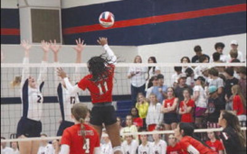 SPIKE - Levelland Loboette Tanaesia Brackens spiked the ball against the Lady Lions during their loss on Tuesday. (Staff photo by Aalijah Soliz)
